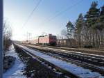 RE 4 mit 112 121 auf dem Weg auf dem Berliner Au�enring zwischen Glasower Damm und Wa�mannsdorf am 22.1.2006.