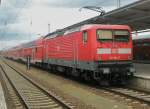 Hier 112 184-7 mit einem RE1 von Eisenh�ttenstadt nach Berlin Lichtenberg, dieser Zug stand am 18.6.2011 in Berlin Lichtenberg.