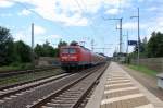 Die 112 125-0 mit einem RE-Zug durch Dedensen-G�mmer.
