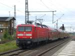 BR 112 als RE4 nach Wismar f�hrt ein in den Bahnhof Neustadt(Dosse).(15.7.2011)
