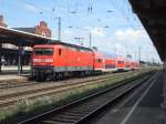 112 112 kam am 06.08.2011 aus Richtung Halle(Saale) und fuhr als RE 20 weiter nach Uelzen.Ausfahrt aus Stendal.