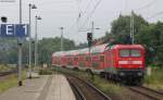 RE 18509 (Stralsund Hbf-Berlin S�dkreuz) mit Schublok 112 111-0 in Neustreliotz 6.8.12