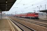 112 189 mit dem RE7 (RE 18715) von W�nsdorf-Waldstadt nach Dessau Hbf, bei der Ausfahrt aus dem Bahnhof Berlin-Sch�nefeld Flughafen.