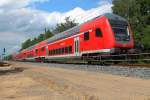 Der RE 4361 auf der RE 5 von Rostock Hbf nach Lutherstadt Wittenberg bei der Durchfahrt in Nassennheide am 22.06.2013.