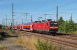 112 148-2 passiert am 22.07.13 die s�dliche Bahnhofseinfahrt von Bad Oldesloe.