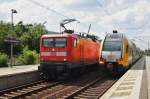 Hier links 112 124 mit einem RE3 (RE18312) von Elsterwerda nach Stralsund Hbf.