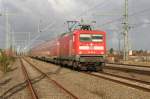 112 116 RE 1 nach Hamburg bei der Ausfahrt aus dem Bf.