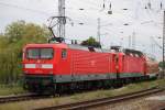 112 114-4+143 333-3 mit RE 18590 von Berlin Hbf(tief)nach Warnem�nde bei der Einfahrt im Bahnhof Warnem�nde.25.05.2015 