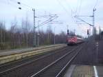 112 143-3 trifft mit dem RE nach Kiel in Elmshorn ein.