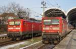Hier links 112 179 mit einem RE70 (RE21021) von Kiel Hbf.