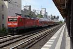 BERLIN, 22.06.2017, 112 189-6 mit der RB14 nach Berlin-Schönefeld fährt am S-Bahnhof Savignyplatz (Stadtbahn) vorbei