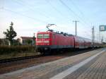 112 122-7 mit RE 33116 (RE5) bei der Ausfahrt aus dem Bahnhof Lutherstadt Wittenberg.