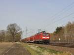 112 149 zieht am 12.04.2022 den RE 70 nach Hamburg Hbf durch Halstenbek