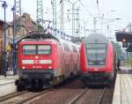 Auf Gleis 1 ist jetzt eingefahren der RE2 (RE 38142) aus Cottbus nach Rahtenow, mit 112 112-8.(+10) Rechts hat bereits Ausfahrt der RE2 (RE 38169) nach Cottbus.
