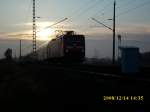112 114 am 14.Dezember 2008 mit dem RE 33212 Rostock-Sassnitz vor Bergen/Rgen.