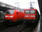 146.105-2 un 112.125-0 mit ihren RE´s nach Bremen und von Wolfsburg am 08.03.2009 in Hannover HBF