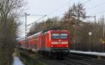 112 179-7 am 2.01.2009 mit einem RE nach Hamburg Hbf in Prisdorf.