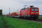 Die 112 160 frdert hier gerade einen RE7 Zug nach Rheine am 10.5.2012 bei Allerheiligen