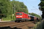 112 145-8 mit einem aus 8 n-Wagen bestehenden RE von Hamburg nach Kiel am 21.06.2008 in Prisdorf