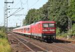 112 176-3 schiebt RB 21224 von Hamburg-Altona nach Neumnster bei der Ausfahrt aus Elmshorn am 09.07.2013