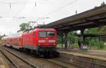 DB 112 139 mit dem RE 17625 von Magdeburg Hbf nach Halle (S) Hbf, am 30.07.2014 in Magdeburg Buckau.