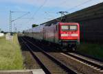Nachschuß auf einen RE7 nach Rheine, der von der 112 134 gerade durch Neuss Allerheiligen geschoben wird.7.6.2015