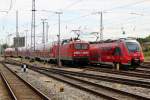Die Rostocker 112 105-2 mit RE 4363 von Rostock Hbf nach Lutherstadt Wittenberg stand noch friedlich im Rostocker Hbf.26.06.2015