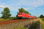 Die 112 102-9 mit dem RE 4364 auf der RE 5 nach Rostock am 01.06.2016 in Nassenheide.	    