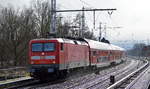 DB Regio Nordost mit  112 117-7  (NVR-Nummer   91 80 6112 117-7 D-DB ) mit dem RE3 nach Stralsund Hbf. am 17.03.21 Berlin Buch.