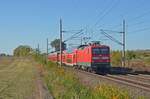 112 107 zog am 24.10.21 einen RE vom Hbf Wittenberg nach Stralsund. Hier passiert der RE3 auf dem Weg nach Berlin Wittenberg-Labetz.