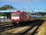 Der Strandexpress Binz-Potsdam wurde,am 06.August 2022,mit der 112 035 bespannt.An der Einfahrt von Bergen/Rügen erwischte ich den Sonderzug.