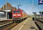 114 011-0 mit Regionalexpress RE 3 Elsterwerda-Stralsund bei der Ausfahrt aus dem bahnhof Doberlug-Kirchhain  Scanfoto: Uwe Wstenhagen Sommer 2006