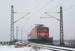 112 145-8 am 15.02.2009 mit einem Schlex nach Hamburg Hbf in Osterrnfeld.