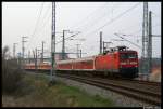 112 116 mit dem Warnemnde-Express aus Warnemnde nach Berlin. Aufgenommen am 04.04.09 kurz hinterm Rostocker Hbf.