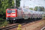 BERLIN, 29.08.2009, 112 182-1 als RE1 nach Frankfurt (Oder) fährt am S-Bahnhof Rummelsburg vorbei