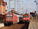 Whrend 101 142-8 mit dem EC 340  Wawel  nach Berlin Hbf(tief) weinend im Bahnhof Lbbenau/Spreewald steht, zeigt mir die 112 115-1 nur seinen  entzckenden  Rcken! Als ich der flnnenden