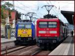 112 122-7 schiebt RE33110 nach Rostock. Auf dem Nachbargleis steht 146 520 vor den Interconnex nach Leipzig. Neustrelitz am 17.07.08