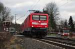 Mit Vollgas fhrt 112 161 den RE 7 nach Mnster (Westf).