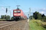 112 118-5 mit dem RE4 Ludwigsfelde (RE 38217) in Friesack(Mark). Gr zurck an den Lokfhrer. 06.09.2010