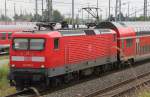 112 116-9 mit RE4356 von Lutherstadt Wittenberg nach Rostock Hbf bei der Einfahrt im Rostocker Hbf.(05.07.2011)