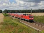 Die 112 185 mit einem RE nach Frankfurt an der Oder am 22.07.2012 unterwegs bei Rosengarten.
