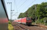 112 155-7 schiebt RE 21024 von Hamburg Hbf nach Kiel Hbf bei der Ausfahrt aus Elmshorn am 09.07.2013