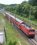 24.5.2014 Dannenwalde. Einfahrt RE 5 nach Stralsund mit 112 103