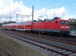 Auf Grund des Ferienende in MV,am 24.August 2014,setzte die Bahn zusätzliche Züge ein.In Züssow wartete 112 187 mit einem zusätzlichen RE nach Berlin auf die UBB von Usedom.