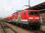 112 108-6( Genau Ihre Richtung )mit RE4310 von Rostock nach Hamburg kurz vor der Ausfahrt im Rostocker Hbf.27.02.2015