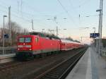 112 121 mit einem  RE 3 nach Stralsund am 19.