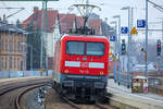 RE 3 mit der Lok 112 110 am Zugschluss bei der Ausfahrt in Pasewalk Richtung Berlin.