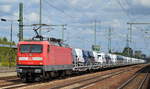 Eigentümlich und rar, eine 112ér vor einem Güterzug, diese 112 166 (9180 6 112 166-4 D-DB) ist momentan möglicherweise auch eine Miet-?, Leihgabe der DB an die Fa.