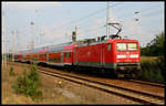 112102-9 fährt hier mit einem Dosto am 24.9.2005 in Berlin Schönefeld ein.