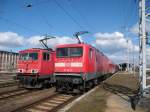 Am 07.04.2013 kam 155 117+185 312 mit einem Hanggartner/DB Schenkerzug durch Stendal in Richtung Wittenberge/Rostock.Und 112 132 schob den RE 20 in Richtung Magdeburg/Halle.